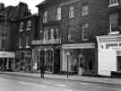 Glossop Road showing (l. to r.) Nos. 251 - 253 Jaeger, ladies outfitters; No. 255 Sternhall, restaurant; No. 257 A. E. Jameson and Co., antique dealers; No. 259 Stephen Matthew Estates Ltd. and No. 261 Soupa-Sarni