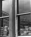 Books in a window with the reflection of Park Hill flats Books in a window with the reflection of Park Hill flats