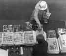 Newspaper seller, Sheffield Midland railway station Newspaper seller, Sheffield Midland railway station