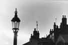 Gas lamp, roof tops and chimneys on West Street Gas lamp, roof tops and chimneys on West Street