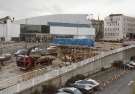 Construction of Park Square Supertram bridge on Commercial Street showing (top left) Ponds Forge International Sports Centre and (top right) Barclays Bank