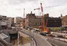 Construction of Park Square Supertram bridge on Commercial Street showing (left) Ponds Forge International Sports Centre and Barclays Bank and (centre) Canada House (the old Gas Company offices)