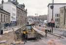 Construction of Fitzalan Square / Ponds Forge Supertram stop, Commercial Street showing (centre left) Canada House (the old Gas Company offices) and (right) Barclays Bank