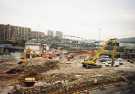 Demolition of Sheaf Market from Exchange Street showing (top left) Park Hill and Norfolk Park Flats and (centre) Park Square Bridge