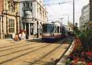 Supertram No. 124 on High Street showing (left) Bradford and Bingley Building Society, Kemsley House Supertram No. 124 on High Street showing (left) Bradford and Bingley Building Society, Kemsley House