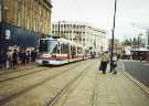Supertram No. 110 on High Street showing (centre) Nos. 59 - 65 C and A Modes Ltd., department store