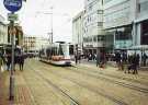 Supertram on High Street showing (centre left) Nos. 59 - 65 C and A Modes Ltd., department store, (centre) No. 42 NatWest Bank and (centre right) Nos. 30 - 34 Halifax Building Society