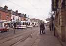 Supertram 103 leaving the Hillsborough Supertram stop, Langsett Road showing (left) Tate's Gallery