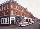 Supertram 110 on West Street passing Nos.152 - 160 Blackwell's, bookshop Supertram 110 on West Street passing Nos.152 - 160 Blackwell's, bookshop