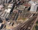 View: sypte00270 Pond Street bus station and Interchange (centre) showing (top right) Ponds Forge Sports Centre, (top centre) Royal Mail sorting office, (bottom centre) Sheffield Midland railway station and (left) Sheffield Polytechnic
