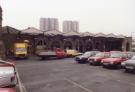 South Yorkshire Passenger Transport Executive (SYPTE). Parcels office and car park, Sheffield Midland railway station showing (back centre) Claywood Flats