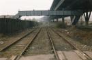South Yorkshire Passenger Transport Executive (SYPTE). Rail tracks and footbridge alongside the Tinsley Viaduct