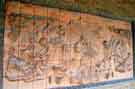 View: t11596 Mural using press-moulded brick/terracotta tiles, by Judith Bluck on wall outside public lavatories, Moorfoot