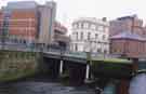 Lady's Bridge showing (left) the Magistrates Courts, (centre) the former Brewer on the Bridge and Lady's Bridge Hotel and (right) the former Exchange Brewery c. 2010