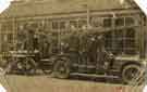 Group of Sheffield firemen on a P-B-Motor Hauling Steamer at unidentified fire station