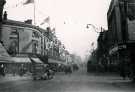 The Moor looking towards Pinstone Street showing (left) Nos. 76 - 90 John Atkinson Ltd. and Nos. 31 - 33 Burton Montague Ltd., tailors