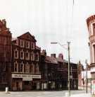 View: t12394 William Green and Co. Ltd., dealers in stove grates, fireplaces and sanitary ware, in the old Britannia Theatre building, Nos. 111 - 115 West Bar