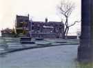 Shops on Broad Lane prior to demolition, from St. George C. of E. Church, Brook Hill Shops on Broad Lane prior to demolition, from St. George C. of E. Church, Brook Hill