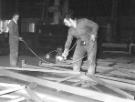 The spraying of fabricated roof structures being undertaken by possibly by Darnall Shotblasting Co. Ltd., Surbiton Street