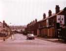 View: t12840 Boarded up houses on Broadfield Road prior to demolition