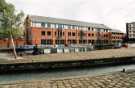 Narrowboat (Synergy) at Victoria Quays showing (back) Nabarro Nathanson, solicitors, No. 1 South Quay Narrowboat (Synergy) at Victoria Quays showing (back) Nabarro Nathanson, solicitors, No. 1 South Quay