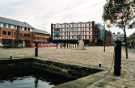 View: t12957 Victoria Quays / Canal Basin, Sheffield and South Yorkshire Navigation showing (centre) Straddle Warehouse and (left) Nabarro Nathanson, solicitors