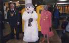 Councillor Frank White, Lord Mayor and Mrs Freda White, Lady Mayoress meet the children's book character the Snowman at the 'Read Me' campaign at Meadowhall Shopping Centre, c.1997 -1998