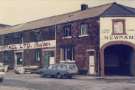 Junction of Effingham Street and Maltravers Street showing (left) Shortall Ltd., upholsterers and (right) Newman, plumbers Junction of Effingham Street and Maltravers Street showing (left) Shortall Ltd., upholsterers and (right) Newman, plumbers