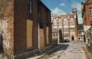 Carver Lane looking towards Cooperative Wholesale Society Ltd., jeans and overall factory, Nos. 70 - 82 West Street