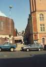 Junction of (foreground) Norfolk Street and (centre) Chapel Walk showing (left) Central United Reform Church, (centre) Harry Earnshaw Ltd., shoe retailer, No. 52 Chapel Walk and (right) Victoria Hall, Methodist church