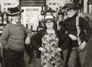 Clayton family showing (l. to r.) George Clayton, Dora Clayton and Ron Clayton in Joe's bar, [Douglas], Isle of Man 
