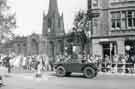 Armoured car on High Street having passed the Cathedral