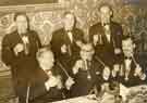 Mr John Gordon Buxton (front left) at a dinner [possibly for St John Ambulance volunteers]