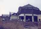 Demolition of Huntsman's Gardens School at the junction of Britnall Street and Titterton Street, showing the school hall