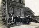 View: u11208 Child jumping from window of Hillsborough Library in Hillsborough during demonstration