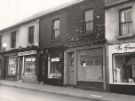 Nos. 98 - 104 Staniforth Road showing No. 100 J. L. Television and No. 102 William Marsden, butchers