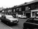 Shops on London Road showing (centre) Nos. 319 - 333 Cowen Barrett Ltd., plumbers merchants and kitchen shop