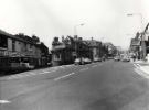 View: u11597 Glossop Road looking towards (left) Convent Walk showing Cosmopolitan Restaurant, Nos, 5 -7 Leadbetter and Peters, opticians and (centre) Barclays Bank, Nos. 207 - 211 Glossop Road