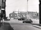 Demolition on Norfolk Lane at the junction with Howard Street showing (centre right) the rear of the Masonic Hall, Surrey Street