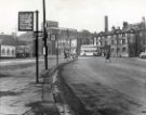 View: u11669 Sheaf Street looking towards Sheaf Square roundabout showing (right) Howard Hotel and (left) Arthur Davy and Sons, bakers, Paternoster Row