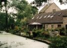 Cottages by the fishpond at The Oakes, Norton