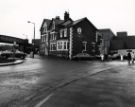 Waggon and Horses Hotel, No. 2 Market Place, Chapeltown showing (left) Burncross Road railway bridge