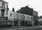 Shops on West Street showing (l.to r.) No. 155 Foto Fare, photographic developing and printing, No. 157 T. Henger, barbers, Nos.159 - 163 Lionel Darlow Ltd., sports shop and No. 167 Arthur Davy and Sons Shops on West Street showing (l.to r.) No. 155 Foto Fare, photographic developing and printing, No. 157 T. Henger, barbers, Nos.159 - 163 Lionel Darlow Ltd., sports shop and No. 167 Arthur Davy and Sons