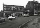 Junction of (foreground) Devonshire Street and (centre) Fitzwilliam Street showing Kennings Ltd., parts centre, Nos. 12 - 14 Raven Tavern and Nos. 8 -10 Neville Watts of Sheffield, architectural and builders ironmongery Junction of (foreground) Devonshire Street and (centre) Fitzwilliam Street showing Kennings Ltd., parts centre, Nos. 12 - 14 Raven Tavern and Nos. 8 -10 Neville Watts of Sheffield, architectural and builders ironmongery
