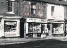 Shops at Heeley showing (l.to r.) No. 4 Heeley and Cooper Ltd., chemists and No. 2 Staley's, newsagents, Forster Road and Laundro Washerette, No. 148 Gleadless Road