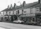 Shops on London Road showing (l. to r.) Nos. 187 - 189 W. S. Moss (Decorators) Ltd., No. 191 J. Deakin, fruiterers, No. 193 E. and B. M. Smith, wool dealers, No. 197 K. Walter Dixon, fish and chips shop, No. 199 W. Johnson, pastrycook 