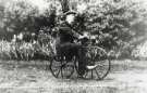 William Whitworth on his boneshaker bicycle, Burrowlee House, Burrowlee Road William Whitworth on his boneshaker bicycle, Burrowlee House, Burrowlee Road
