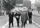 Unidentified group visit to construction of new Magistrates Court, Snig Hill looking towards (right) Angel Street