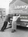 'Bump starting' a mobile library showing (left) librarian, Keith Morris