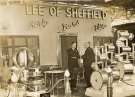 Mr Omer and Mr T. Jubb at the stand of (Lee of Sheffield Ltd.) Arthur Lee and Sons Ltd., steel manufacturers, at the British Industries Fair, Olympia, London Mr Omer and Mr T. Jubb at the stand of (Lee of Sheffield Ltd.) Arthur Lee and Sons Ltd., steel manufacturers, at the British Industries Fair, Olympia, London
